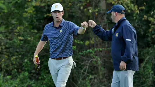 Braedon Wear celebrates a birdie at Black Creek