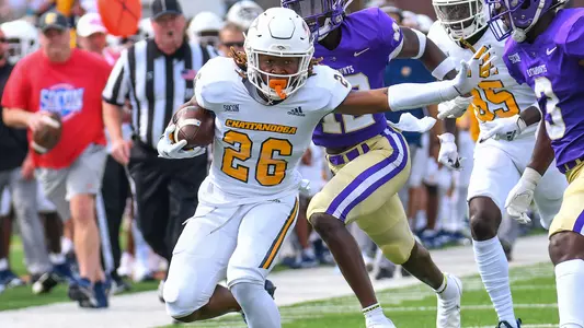 Jamoi Mayes breaks a tackle against Western Carolina.