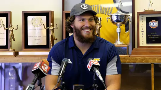 Cole Strange answers questions at the team's weekly press conference.