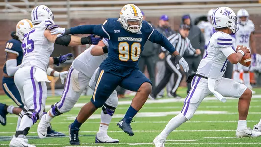 Devonnsha Maxwell hones in on the Furman runner.
