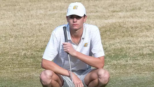 Matt Smith reads the green early in round 1 of the Linger Longer Invite.