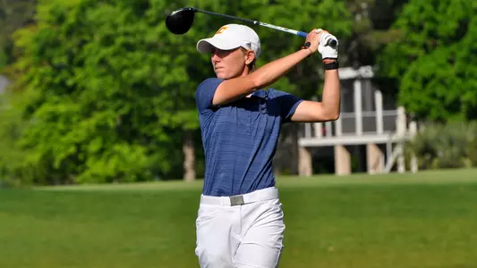 Dorota Zalewska smokes her drive in first round play at SoCon Championships.