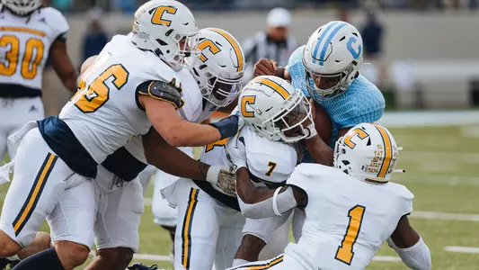 Mocs D swarms Citadel ball carrier for a loss in Charleston.