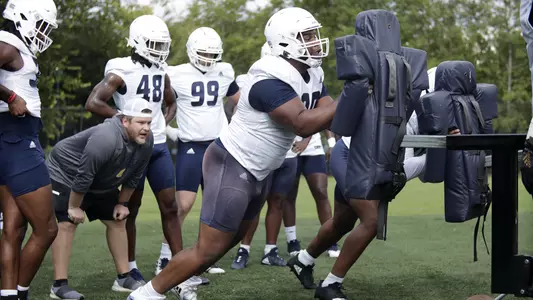 Devonnsha Maxwell hits the sled.
