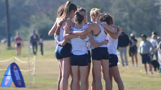 women's huddle before socon championships