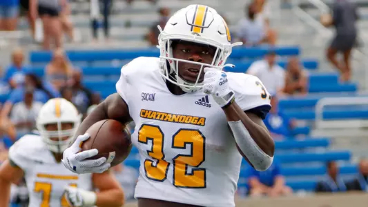 Ailym Ford rumbles into the Kentucky secondary.