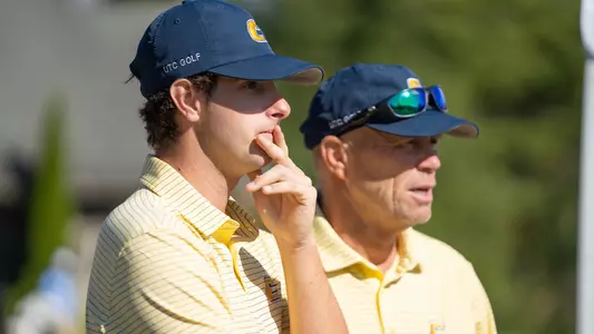 Braedon Wear & Mark Guhne discuss his next shot.