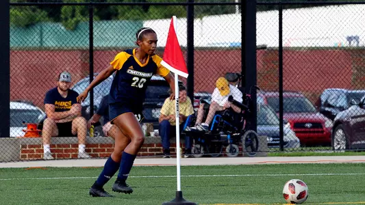 JaNiya Stevens lines up a corner kick