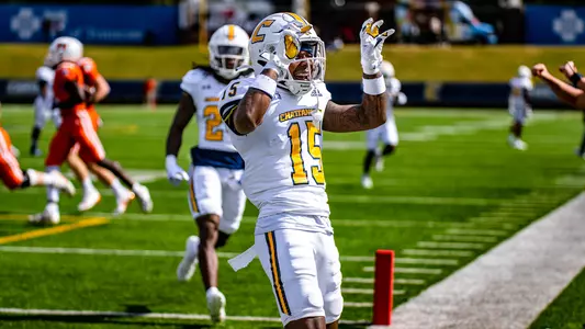 Kam Brown celebrates after his pick 6 started the 2022 rout of Mercer at Finley Stadium.