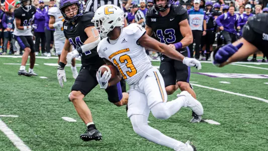 Tyron Arnett runs a route during a career day at Furman.