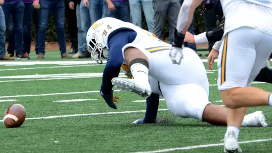 Marlon Taylor pounces on a Furman fumble.