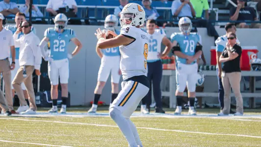 Preston Hutchinson start to throw a 25-yard connection with Tyler Smith at The Citadel.