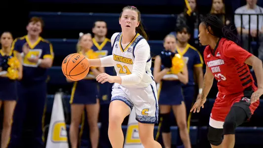 Addie Grace Porter brings the ball upcourt.