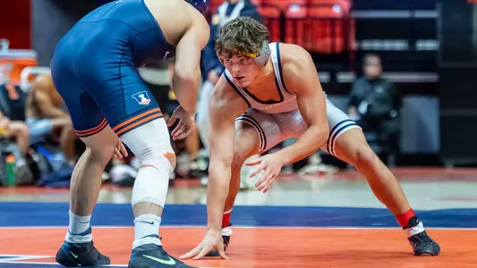 Lincoln Heck eyes his opponent in his win at Illinois