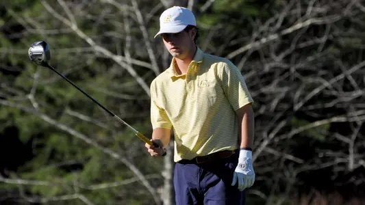 Braedon Wear approaches the tee at Black Creek
