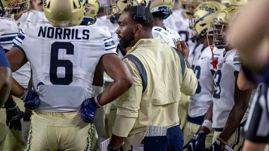 Anthony Davis II on the Akron sideline