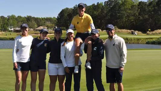 The Mocs hoisted medalist Dorota Zalewska on their shoulders celebrating here SoCon Medalist win.