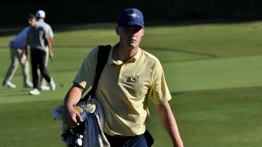 Paul Conroy walks to the next tee at Black Creek
