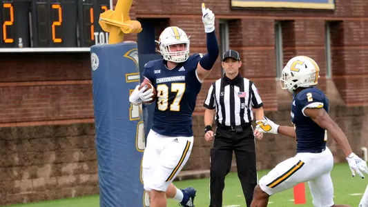 Jay Gibson celebrates a TD catch in 2019 win over Wofford.