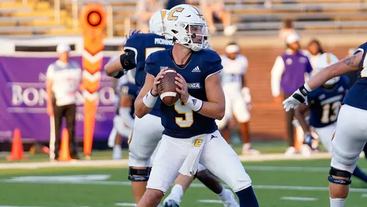 Preston Hutchinson sits safely in the pocket looking for an open receiver.