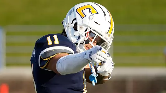 Sam Phillips points to move the chains after a big catch against North Alabama.