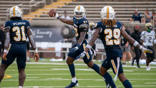 Ben Brewton celebrates fumble recovery against Wofford.