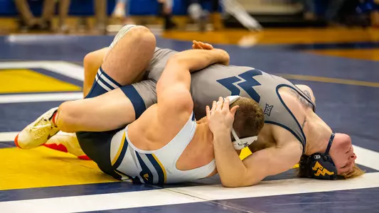 Rocky Jordan gets his West Virginia opponent's back on the mat in building a major decision win