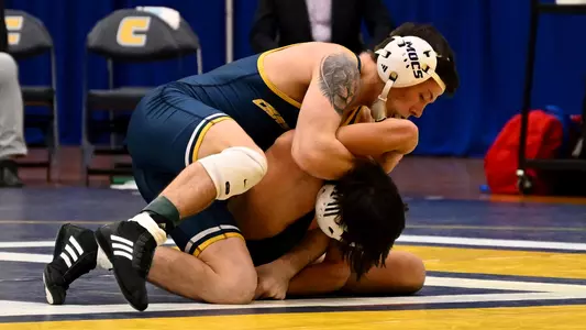 Logan Ashton is working on starting his pinning sequence against Davidson