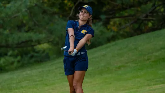 Violeta Fernandez-Tagle applies some body "English" leaning left asking her iron shot to turn over