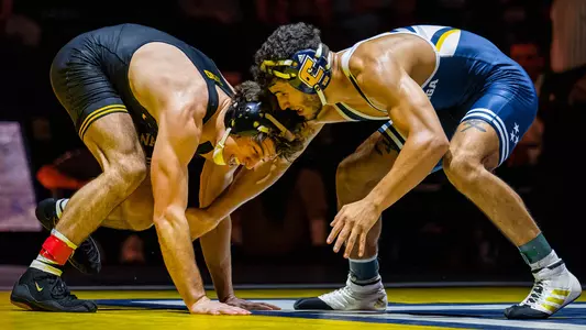 Noah Castillo shoots at the leg in his matchup against Iowa in the Roundhouse
