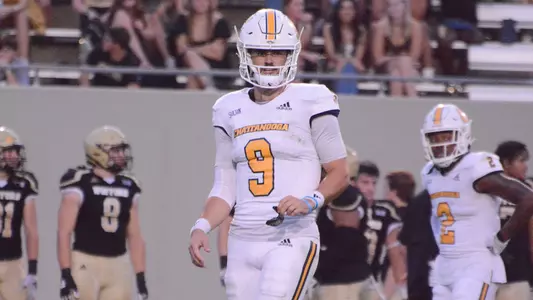 Chase Artopoeus looks to the sidelines for the next play in the win at Wofford