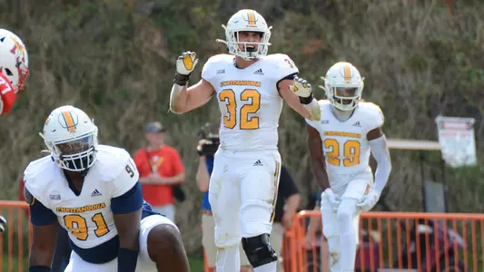 Kobe Joseph shouts a defensive call prior to the snap at VMI.