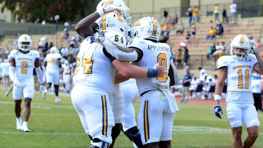 Offense celebrates Gino Appleberry touchdown at VMI