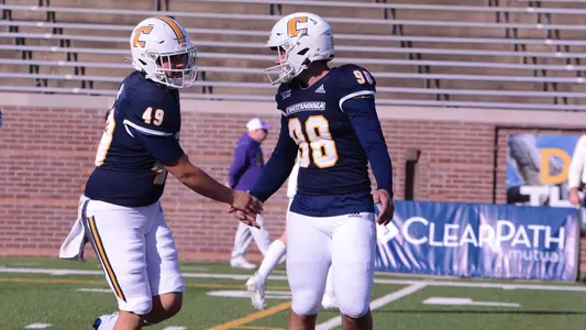 Clayton Crile and Jake Hall congratulate each other on another successful kick against Western Carolina
