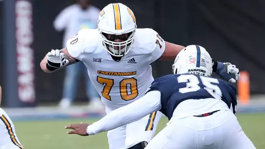 Griffin McDowell prepares to flatten a Samford defender on the second level in the 2023 win in Birmingham
