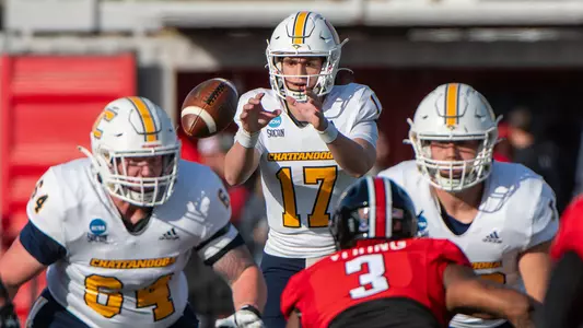 Luke Schomburg takes the snap in the FCS Playoffs win at Austin Peay