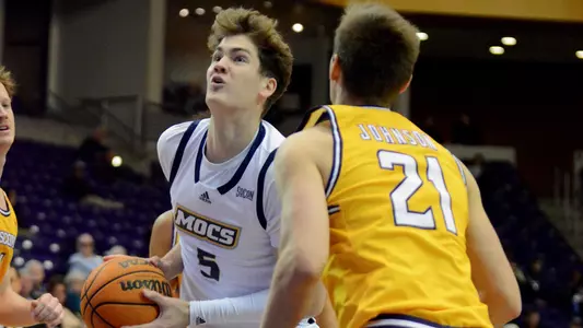 Sean Cusano drives to the hoop at Lipscomb