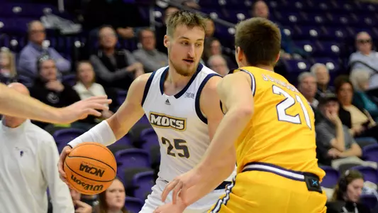 Jan Zidek looks for opening to drive against Lipscomb