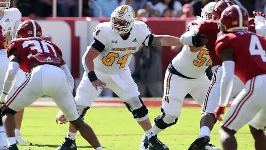 Reid Williams anchors the offensive line at Alabama