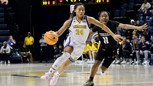 Jada Guinn drives the lane in the win over North Alabama