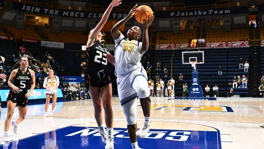 Raven Thompson drives for a bucket in the win over North Alabama
