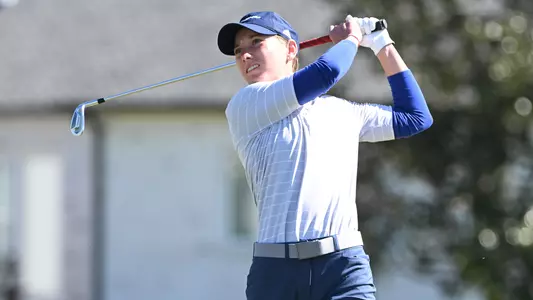 Dorota Zalewska follows her iron shot at the Tulane Classic