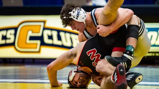 Lincoln Heck drives his Gardner-Webb opponent into the mat.