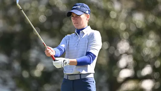Dorota Zalewska takes aim with her pitching wedge in her pre-shot routine at Tulane