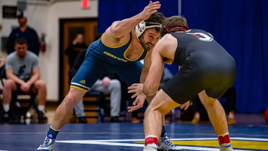 Jake Boyd locks up with his opponent in a win over Davidson