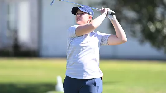 Kera Healey follows her iron shot at the Tulane Classic.