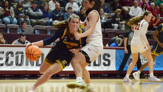 Addie Grace Porter drives against Virginia Tech