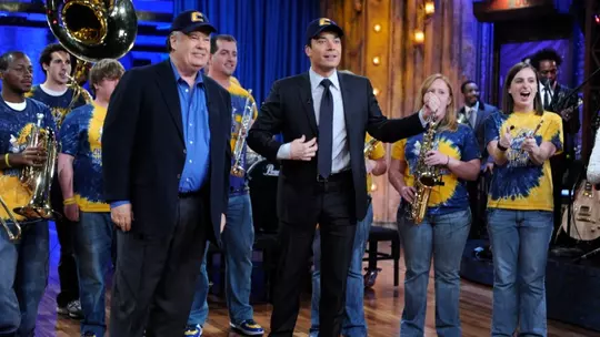 LATE NIGHT WITH JIMMY FALLON -- Episode 13 -- Pictured: (back) University of Tennessee Chattanooga Band, (front, l-r) Dennis Haskins, Jimmy Fallon -- NBC Photo: Dana Edelson