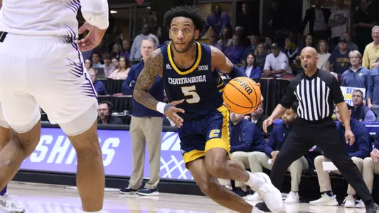 Jamal Johnson looks to attack the basket against Furman