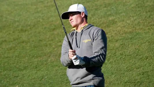 John Houk stares down his tee shot at the Country Club of Sapphire Valley